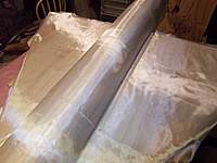 Name: 100_3830.jpg
Views: 210
Size: 56.3 KB
Description: Fuselage waiting for resin . I use 1 oz cloth for solidity