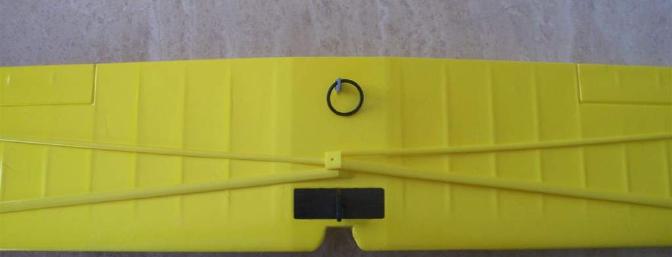No unsightly rubber bands, no heavy bolts.  This o-ring does a perfectly invisible job of securing the wing.