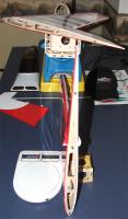 Name: 032.jpg
Views: 592
Size: 70.4 KB
Description: Another view, there are 3 alignment pins on this wing.  The fit to the fuse is snug and perfect!!  I like the design and fit on the 50 size a lot.  It is scaled up nicely!!