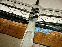 Name: DSCF4218.jpg
Views: 629
Size: 196.9 KB
Description: Adding the wing using just the front bolt.  Please don't ask about the blue ooze on the front of the table.  It's silicone left over from an experiment gone bad.