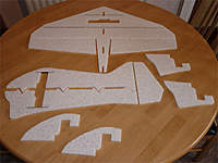 Name: P1020063_Layer%201.jpg
Views: 648
Size: 46.8 KB
Description: All the bits cut out and the 4 pieces of carbon glued in place