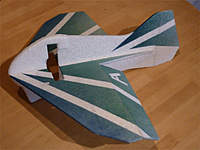 Name: P1020088_Layer%201.jpg
Views: 607
Size: 45.0 KB
Description: Top half and rudder added. Ready for the radio gear and power system. This one weighed 53g at this point.
Uhu Por works great for the hinges. It's easy, nearly invisible and strong.