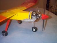 Name: DCP01721.jpg
Views: 88
Size: 50.6 KB
Description: This plane duplicates one that I built in the 70's except I used an OS .15 back then . What a great funflyer and an even better trainer .