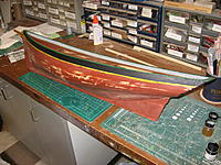 Name: IMG_3194.jpg
Views: 99
Size: 300.3 KB
Description: Restoration by Mystic had black above yellow stripe. Green below to the waterline then red below.