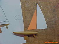 Name: VictorV32Micro8.jpg
Views: 40
Size: 35.7 KB
Description: The orange and white sails!