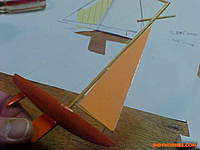 Name: VictorV32Micro18.jpg
Views: 39
Size: 26.3 KB
Description: I mounted the "sails" using a teeny tiny bead of Tacky Glue.  It dries clear.