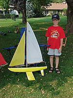 Name: Sail80.jpg
Views: 58
Size: 62.3 KB
Description: Here's a photo of my son with a friend's V32.  You can see the outline of the real thing here.