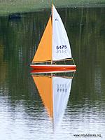 Name: SeptemberRegatta2012 005R.jpg
Views: 26
Size: 98.5 KB
Description: Scott's "Sunkist" hull in orange and white.  Neat photo.