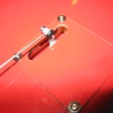 The servo is glued to the inside of the hatch. The servos were installed in the outer wing panels with aileron connections, which worked very well.