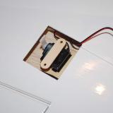 This top uses two wood screws to attach the servo firmly to the base plate.