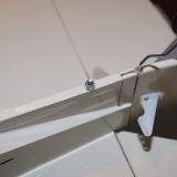 The small lock nuts secure the tail.