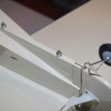 The tail is attached but remains removable, and with the two piece wing, it remains highly transportable.
