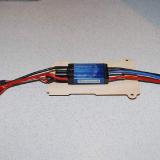 Here you see the mounting plate for the E-flite 60 amp ESC.