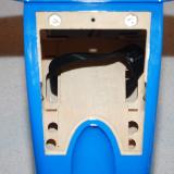The ESC and battery floor assembly drops in and attaches with the bolts.