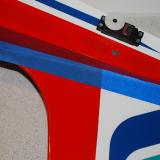 Painters tape attached to the bottom of the fin will tell us how much covering to remove.