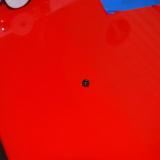 A small bolt keeps the stabilizer from separating. The factory installed a blind nut for this bolt.