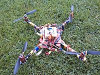 Name: 2012-07-16 15.53.08-800.jpg
Views: 74
Size: 111.1 KB
Description: Quad at 46cm mtm.  1200kv Emax CF2822 motors, with 8x4.5 props.  HK KK v2 FC.  wgt.: 1067g, AUW, with 2200 mah  battery. My first build.  Heavy, but responsive.