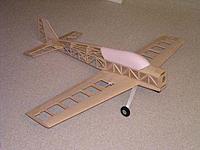 Name: 1 full frontal.jpg
Views: 175
Size: 35.8 KB
Description: E-Rotica - at the back end of 16 NiMh cell high performance aerobatic models. Weighed just over five pounds, with a 34oz battery