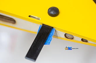 Marking the tab assembly depth with a piece of tape