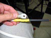 Name: ProbeHookup.jpg
Views: 5107
Size: 83.5 KB
Description: How I attached the probe tips.  You can see through the yellow heatshrink how the ring terminal was bent into a U shape and soldered to the probe tip.