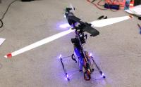 Name: lighting01.jpg
Views: 602
Size: 91.9 KB
Description: The first attempt at autonomous lighting was 6 LEDs at
strategic locations in an attempt to light the rotor and the tail.  In flight, it only lit 4 small circles on the rotor.  