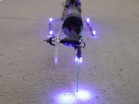 Name: lighting02.jpg
Views: 473
Size: 92.1 KB
Description: The first attempt at autonomous lighting was 6 LEDs at
strategic locations in an attempt to light the rotor and the tail.  In flight, it only lit 4 small circles on the rotor.  