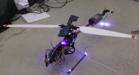 Name: lighting07.jpg
Views: 420
Size: 75.5 KB
Description: The first attempt at autonomous lighting was 6 LEDs at
strategic locations in an attempt to light the rotor and the tail.  In flight, it only lit 4 small circles on the rotor.  