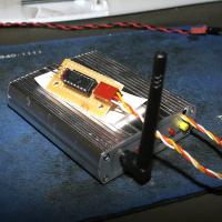 Name: ground06.jpg
Views: 277
Size: 162.0 KB
Description: The 2.4Ghz receiver is hacked to match the impedance of the RC
transmitter.  Without it, the signal would be lifted to 5V by the
transmitter emissions.
