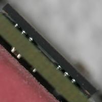 Name: gumstix25.jpg
Views: 271
Size: 84.4 KB
Description: The SDRAM chips R held in by the tiniest solder balls.  Probably the
tiniest amount of force cracked 1 of them somewhere or maybe a chip
flexed just enough down the middle to crack somewhere invisible.
