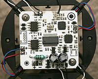 Name: syma03.jpg
Views: 530
Size: 217.8 KB
Description: The Syma lacks a discrete accelerometer chip, so the accelerometer must be integrated in the mane microcontroller, which they completely ground the part number off.