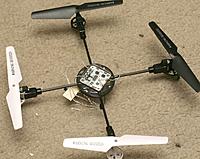 Name: syma10.jpg
Views: 236
Size: 211.0 KB
Description: Adding the tracking LED made it nose heavy.