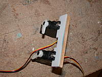 Name: fuse-servos (4).jpg
Views: 350
Size: 99.6 KB
Description: 3/16" sq hardwood glued to cut-off section, servos installed.