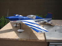 Name: Various 185.jpg
Views: 260
Size: 84.7 KB
Description: Finished and waiting for the maiden flight.  Added the red and black stripes.