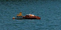 Name: 2011.06.26.0265.jpg
Views: 90
Size: 296.1 KB
Description: Nothin's too big for for Capt'n Rich's river tug!!