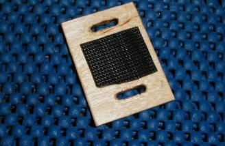 A small ply piece allows use of a Velcro strap