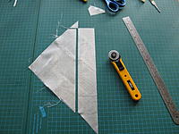 Name: IMG_2057.JPG
Views: 40
Size: 1.94 MB
Description: Cutting an oversized piece of FG on a 45-degree bias.