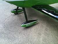 Name: AMR2.jpg
Views: 212
Size: 62.4 KB
Description: I dressed up the stock plain green wheel pants with black tops and some white pen striping.