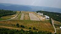 Name: Landing at Harris Hill airport.jpg
Views: 701
Size: 61.9 KB
Description: On final into Harris Hill.