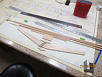 Name: IMG_4509.JPG
Views: 212
Size: 2.47 MB
Description: All the parts for the horizontal tail.  The two "spars" are exactly the same in outline!  The grooves in the spruce joiners accommodate the brass tubes precisely.  I guess that the 1/4" rectangular sheet is for the gussets.