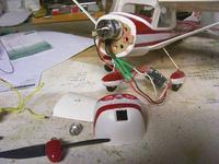 Name: Cessna_Guillows_16_Aoxing_outrunner.jpg
Views: 3623
Size: 48.5 KB
Description: Overpowered Aoxing outrunner and TBird9, with GWS Pico rec.  The next size smaller motor would be fine, although I would have had to mount the batt further forward for CG setting.