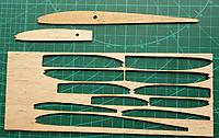 Name: @laser cutting.jpg
Views: 14
Size: 544.7 KB
Description: laser cut ribs - that leading edge divot would be hell to do accurately with a #11, and the spar hole too