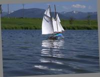 Name: image0002.jpg
Views: 510
Size: 31.9 KB
Description: Sailing under fore&aft sails only. With 2# of ballast, the hull rides much lower.