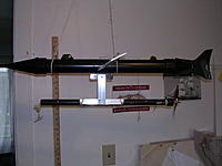 Name: image0004.jpg
Views: 115
Size: 44.1 KB
Description: Propulsion pod. The pod is held to the aluminum angle frame with a pair of rubberbands. Ballast tube, not shown, rides on frame above powerpod.
