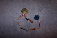 Name: 100_5796.jpg
Views: 542
Size: 103.7 KB
Description: Pic 3 - Futaba GY240 gyro without case and direct wired HS50.  I bought this used.  The wires do not have shrink wrap on the solders.  I encourage anyone to unsolder and install shrink wrap before using.