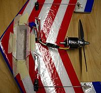 Name: DSCN7433_Rebel S14 electronics install.jpg
Views: 31
Size: 367.0 KB
Description: Slowly cutting away the foam from this pocket, and testing depth with the flight battery as I went, all foam was eventually removed exposing the reinforcement tape on the bottom side of the wing.