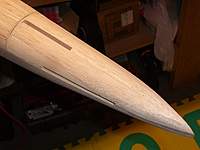 Name: Tailtop.jpg
Views: 197
Size: 49.0 KB
Description: After LOTS of sanding, looking like a Mossy tail. The vertical stab will be glued in place, the horizontal stab will be removable