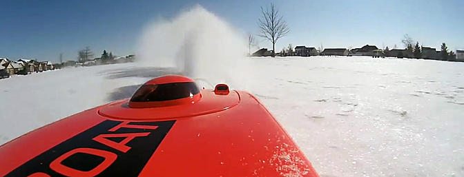 rc boat in snow