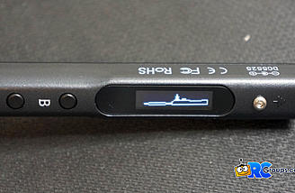 Shows an image of the iron with an arrow pointing to the A button