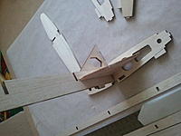 Name: 2012-05-14_14.17.50.jpg
Views: 124
Size: 127.5 KB
Description: How to ensure you get a correctly aligned spar to end rib fitting.  Place the wing jig into position and whilst using that third hand you never seem to have use something else to square it side to side and then once happy tack the jig in place with CA.  T