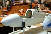 Name: ASK18 002.jpg
Views: 635
Size: 68.2 KB
Description: I was not in love with the tired white fuselage so cracks were repaired, dings filled and here it sits prepped for paint in March 2010